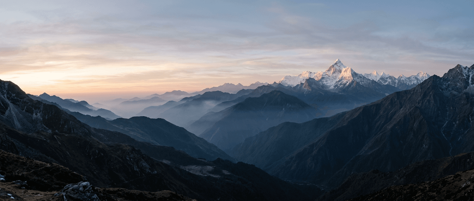 Layered mountain ridges with a distant summit